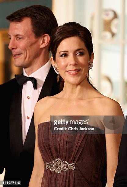 Crown Princess Mary of Denmark and Prince Joachim of Denmark take part in a receiving line ahead of an official dinner at the Royal Palace on March...