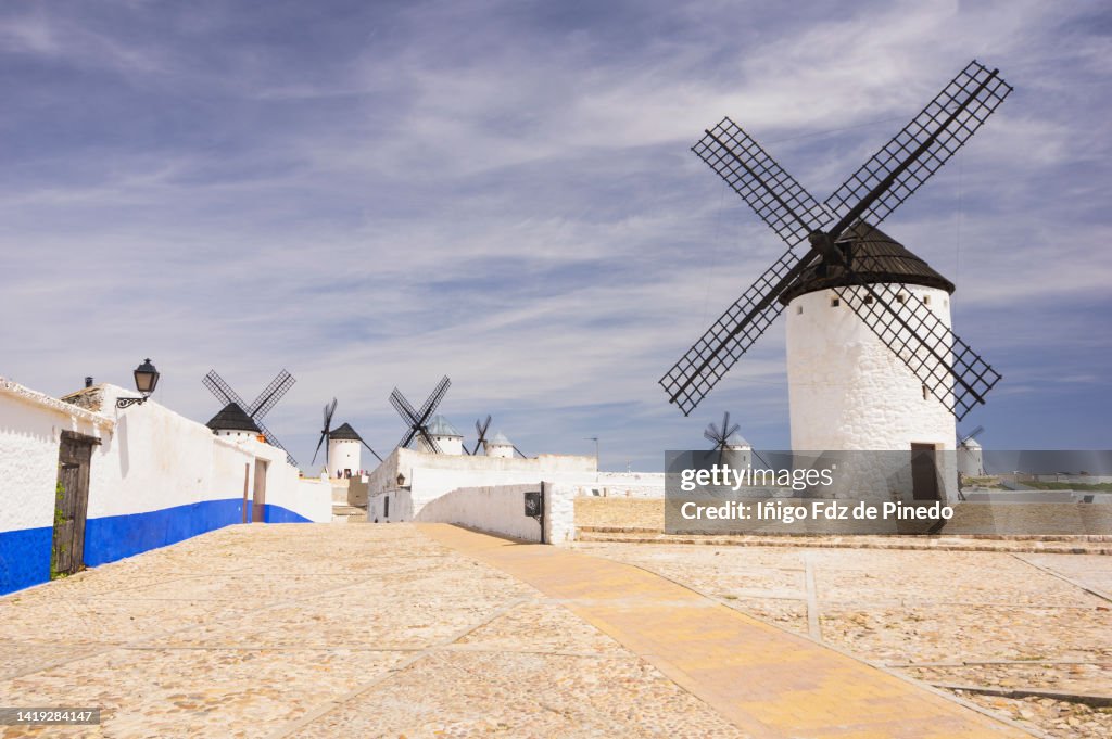Traditional windmills and houses in Campo de Criptana, Ciudad Real, Spain.