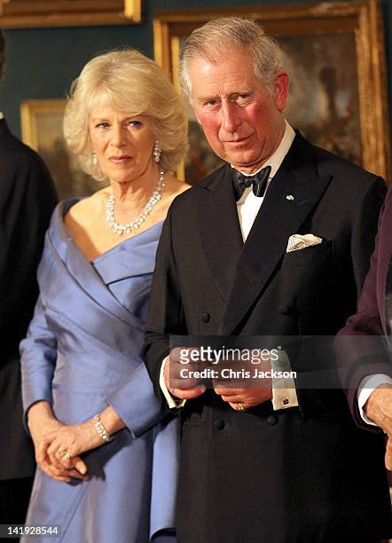 Camilla, Duchess of Cornwall and Prince Charles, Prince of Wales take part in a receiving line ahead of an official dinner at the Royal Palace on...