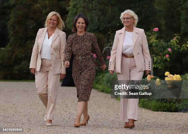 German Interior and Homeland Minister Nancy Faeser, Foreign Minister Annalena Baerbock and Defense Minister Christine Lambrecht arrive to speak to...