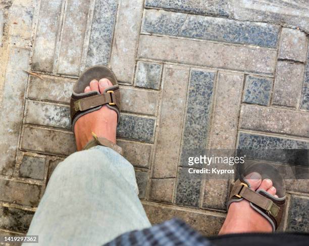 man wearing synthetic sandals - nylon feet stock pictures, royalty-free photos & images