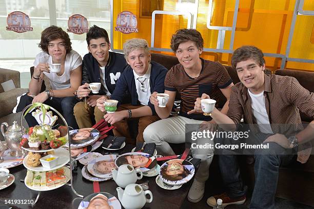 Harry Styles, Zayn Mali, Niall Horan, Louis Tomlinson and Liam Payne from One Direction Visit ET Canada on March 26, 2012 in Toronto, Canada