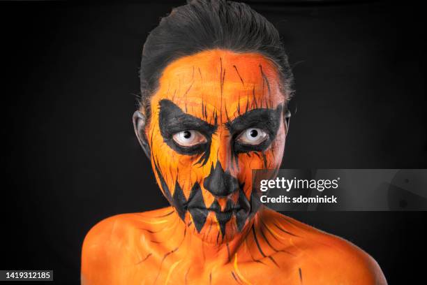 creepy jack o lantern face paint - halloween face paint stock pictures, royalty-free photos & images