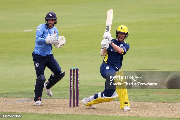 Nick Gubbins of Hampshire hits out while Kent keeper Ollie Robinson looks on during the Royal London Cup Semi Final between Hampshire and Kent...