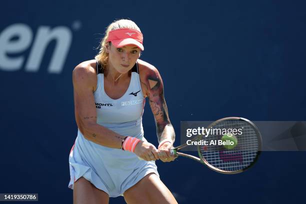 Tereza Martincova of Czech Republic plays a forehand against Kaia Kanepi of Estonia in their Women's Singles First Round match on Day Two of the 2022...