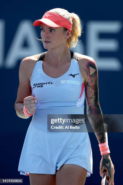 Tereza Martincova of Czech Republic reacts to a point against Kaia Kanepi of Estonia in their Women's Singles First Round match on Day Two of the...