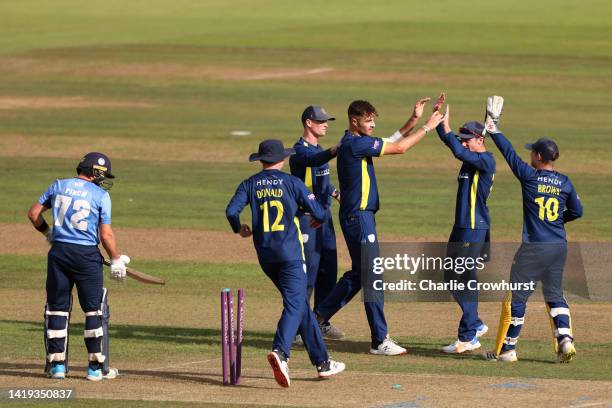 Jack Campbell of Hampshire celebrates with team mates after taking the wicket of Kent's Darren Stevens during the Royal London Cup Semi Final between...