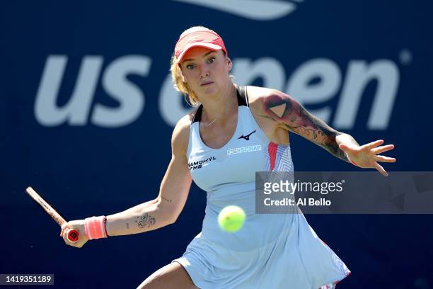 Tereza Martincova of Czech Republic plays a forehand against Kaia Kanepi of Estonia in their Women's Singles First Round match on Day Two of the 2022...