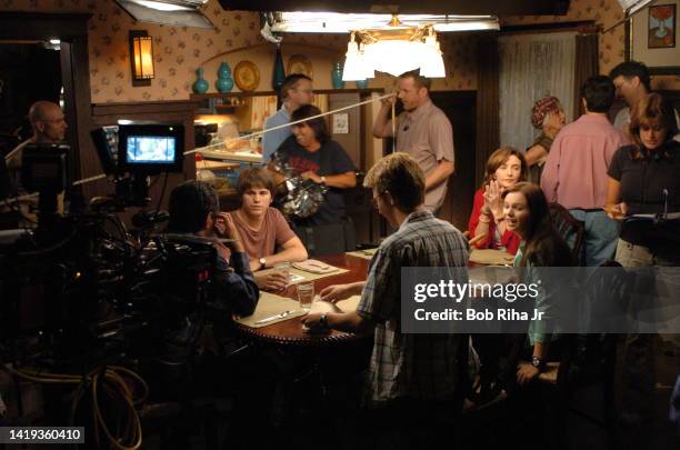 Actors Mary Steenburgen, Joe Mantegna, Amber Tamblyn, Michael Welch and Jason Ritter rehearse a scene on the set of tv show 'Joan of Arcadia', August...