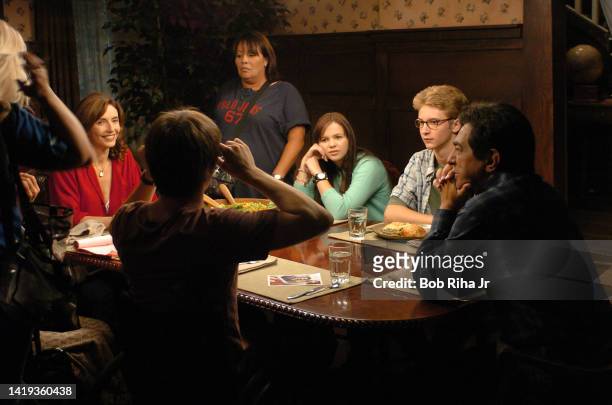 Actors Mary Steenburgen, Joe Mantegna, Amber Tamblyn, Michael Welch and Jason Ritter rehearse a scene on the set of tv show 'Joan of Arcadia', August...