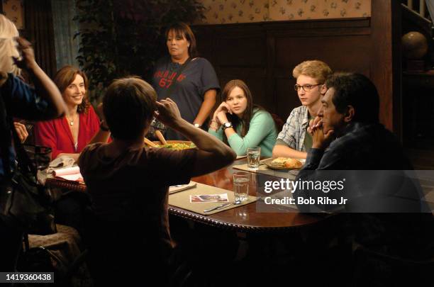 Actors Mary Steenburgen, Joe Mantegna, Amber Tamblyn, Michael Welch and Jason Ritter rehearse a scene on the set of tv show 'Joan of Arcadia', August...