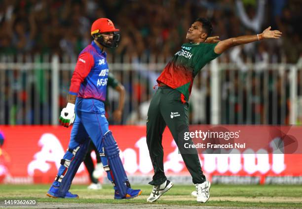 Mohammad Saifuddin of Bangladesh celebrates the wicket of Mohammad Nabi of Afghanistan during the DP World T20 match between Bangladesh v Afghanistan...