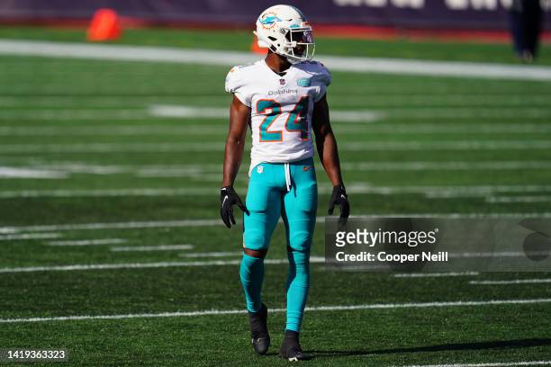 Byron Jones of the Miami Dolphins scans the field during an NFL game against the New England Patriots, Sunday, Sep. 13 in Foxborough, Mass.