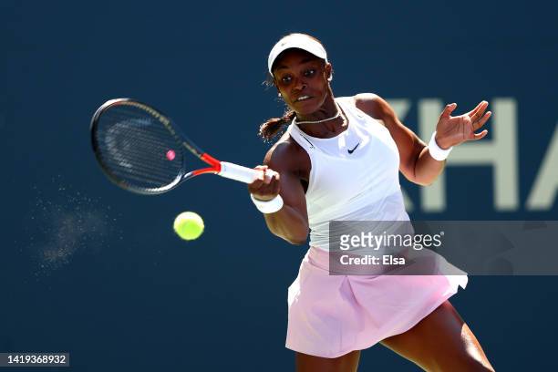Sloane Stephens of the United States plays a forehand against Greet Minnen of Belgium in their Women's Singles First Round match on Day Two of the...