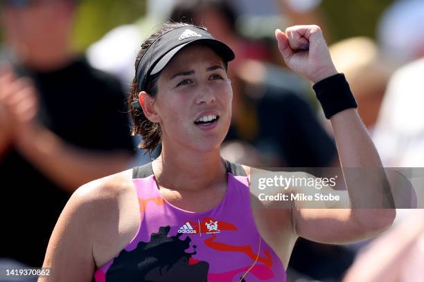 Garbine Muguruza of Spain celebrates after defeating Clara Tauson of Denmark in their Women's Singles First Round match on Day Two of the 2022 US...