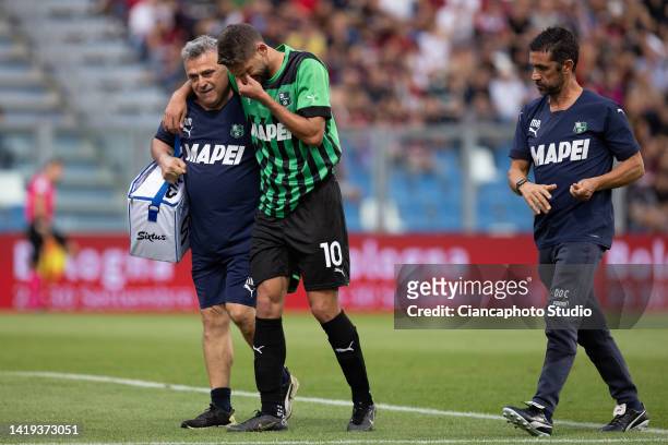 Domenico Berardi of US Sassuolo leaves the pitch injured during the Serie A match between US Sassuolo and AC MIlan at Mapei Stadium - Citta' del...