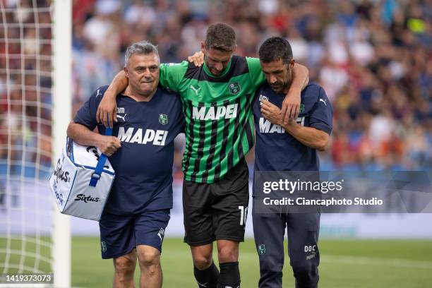 Domenico Berardi of US Sassuolo leaves the pitch injured during the Serie A match between US Sassuolo and AC MIlan at Mapei Stadium - Citta' del...