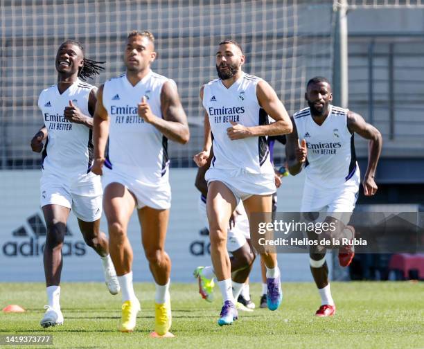 Karim Benzema, Eduardo Camavinga, Mariano Diaz and Antonio Rudiger of Real Madrid in action during a training session at Valdebebas training ground...