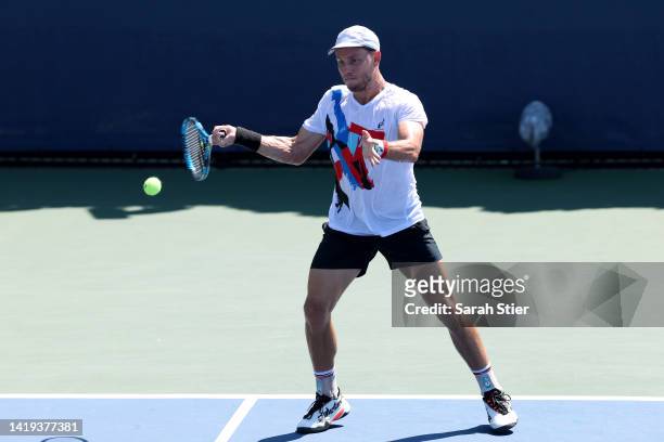 James Duckworth of Australia plays a forehand against Christopher O'Connell of Australia in their Men's Singles First Round match on Day Two of the...