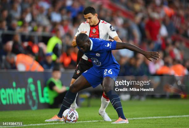 Kalidou Koulibaly of Chelsea battles for possession with Mohamed Elyounoussi of Southampton during the Premier League match between Southampton FC...