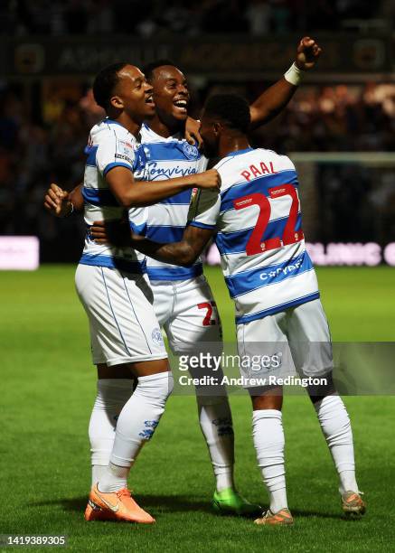 Ethan Laird of Queens Park Rangers celebrates after scoring their team's second goal with teammates Kenneth Paal and Chris Willock during the Sky Bet...