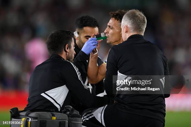 Rodrigo Moreno of Leeds United receives medical treatment after being challenged by Jordan Pickford of Everton during the Premier League match...