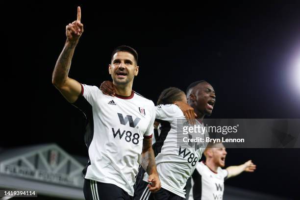 Aleksandar Mitrovic of Fulham celebrates after scoring their team's first goal during the Premier League match between Fulham FC and Brighton & Hove...