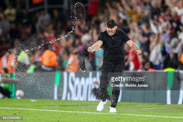 Head Coach Ralph Hasenhuttl of Southampton celebrates by squeezing a bottle of water after Adam Armstrong of Southampton scores a goal to make it 2-1...