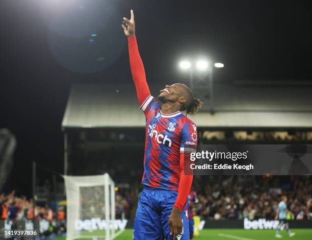 Wilfried Zaha of Crystal Palace celebrates after scoring their team's first goal during the Premier League match between Crystal Palace and Brentford...