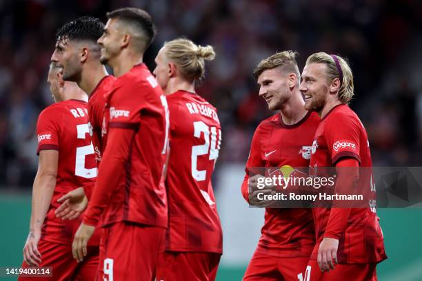 Emil Forsberg of RB Leipzig celebrates with teammate Timo Werner after scoring their team's sixth goal during the DFB Cup first round match between...