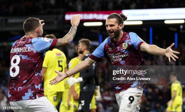 Jay Rodriguez of Burnley celebrates with teammate Josh Brownhill after scoring their team's second goal during the Sky Bet Championship between...