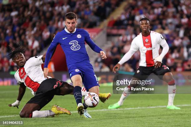 Mason Mount of Chelsea is challenged by Mohammed Salisu of Southampton during the Premier League match between Southampton FC and Chelsea FC at...