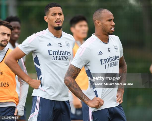 William Saliba and Gabriel of Arsenal during a training session at London Colney on August 30, 2022 in St Albans, England.