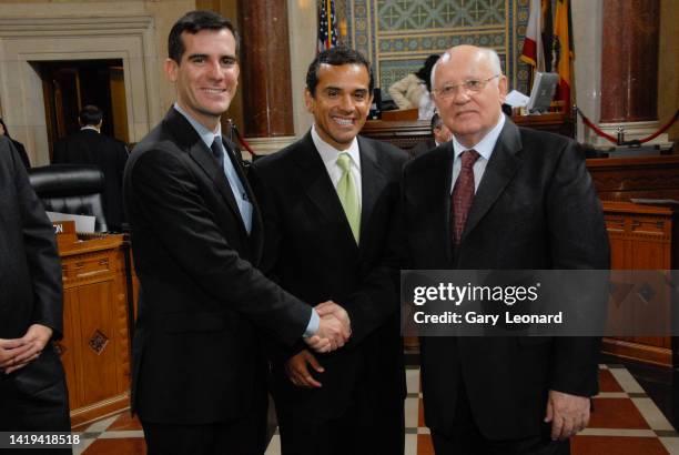 With Mayor Antonio Villaraigosa in the middle Council President Eric Garcetti shakes hands with Soviet Union President Mikhail Gorbachov as the three...