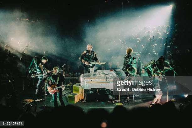 Richard Reed Parry, Win Butler, Tim Kingsbury, Régine Chassagne and Sarah Neufeld of Arcade Fire perform at The 3Arena Dublin on August 30, 2022 in...