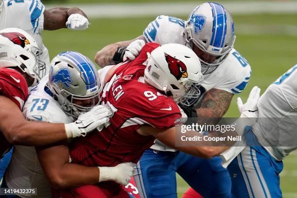 Jonah Jackson of the Detroit Lions and offensive tackle Taylor Decker protect the passer during an NFL football game against the Arizona Cardinals on...