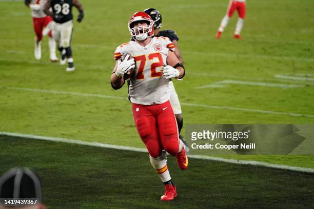 Eric Fisher of the Kansas City Chiefs catches the ball and celebrates a touchdown during an NFL game between the Baltimore Ravens and the Kansas City...