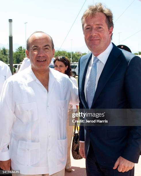 President of Mexico, Felipe Calderon meets with host of CNN's 'Piers Morgan Tonight', Piers Morgan on March 25, 2012 in Puerto Vallarta, Mexico.