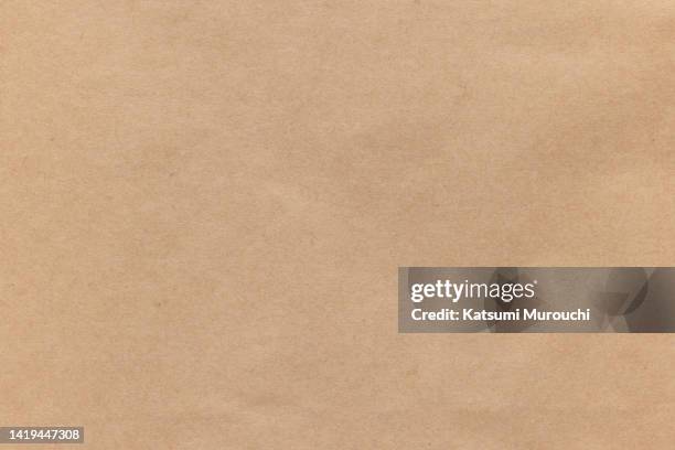 brown paper texture background - packpapier stock-fotos und bilder
