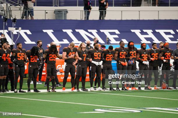 The Cleveland Browns during the national anthem before an NFL game against the Dallas Cowboys on October 4, 2020 in Arlington, Texas.