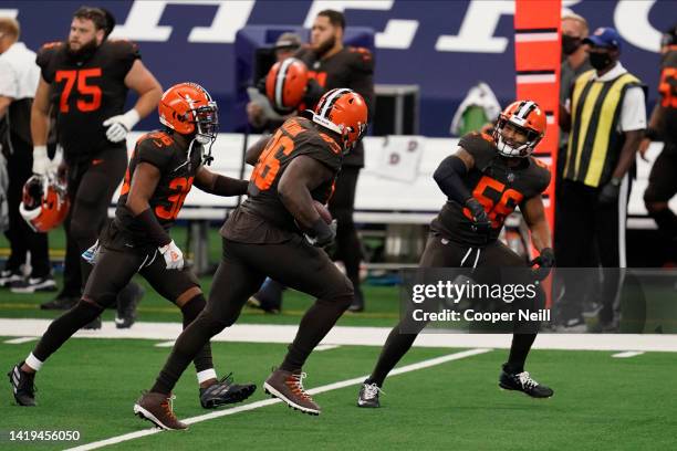 Malcolm Smith of the Cleveland Browns celebrates with teammates during an NFL game against the Dallas Cowboys at AT&T Stadium on October 04, 2020 in...