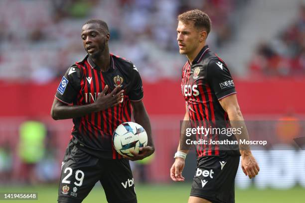 Nicolas Pepe and Aaron Ramsey of OGC Nice react as the team is awarded a late free kick during the Ligue 1 match between OGC Nice and Olympique...