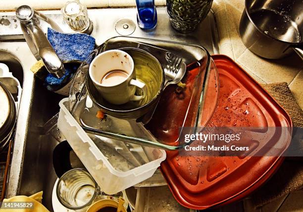 dirty dishes - messy kitchen stock pictures, royalty-free photos & images