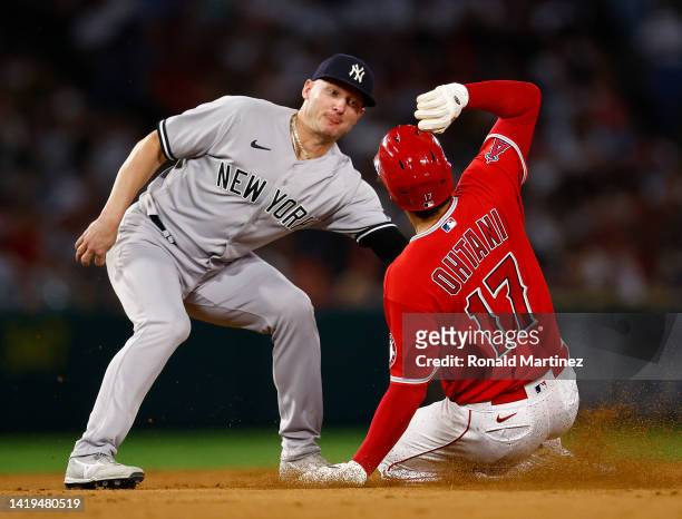 Shohei Ohtani of the Los Angeles Angels is caught stealing second against Josh Donaldson of the New York Yankees in the sixth inning at Angel Stadium...