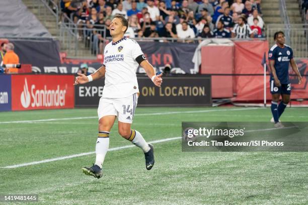 Javier Hernández of LA Galaxy celebrates scoring a goal against New England Revolution during a game between Los Angeles Galaxy and New England...