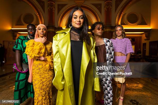 Thelma Plum , the M/FW 2022 Ambassador, poses for a photograph with models at the launch of Melbourne Fashion Week at the Dome on August 31, 2022 in...