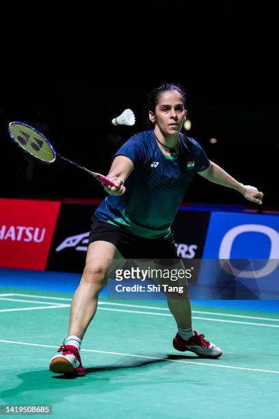 Saina Nehwal of India competes in the Women's Singles First Round match against Akena Yamaguchi of Japan during day two of Daihatsu Yonex Japan Open...