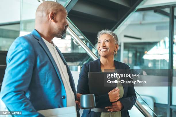 employee, corporate and smile business people talking and working in the morning in formal office space. work colleagues planning team strategy project in marketing or advertising company - formal office stock pictures, royalty-free photos & images