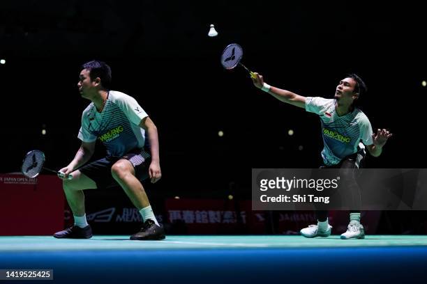 Mohammad Ahsan and Hendra Setiawan of Indonesia compete in the Men's Doubles First Round match against Kang Min Hyuk and Seo Seung Jae of Korea...