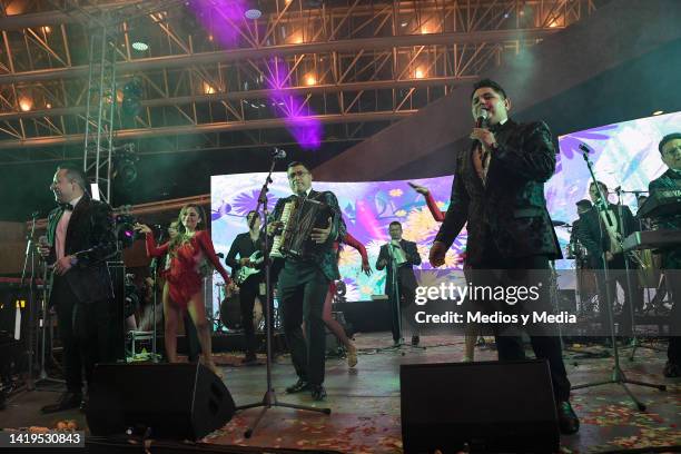 Aaron y su grupo Ilusión group performing during a show as part of the BMB Bookin Management Brokers 2022 at Auditorio Nacional on August 30, 2022 in...